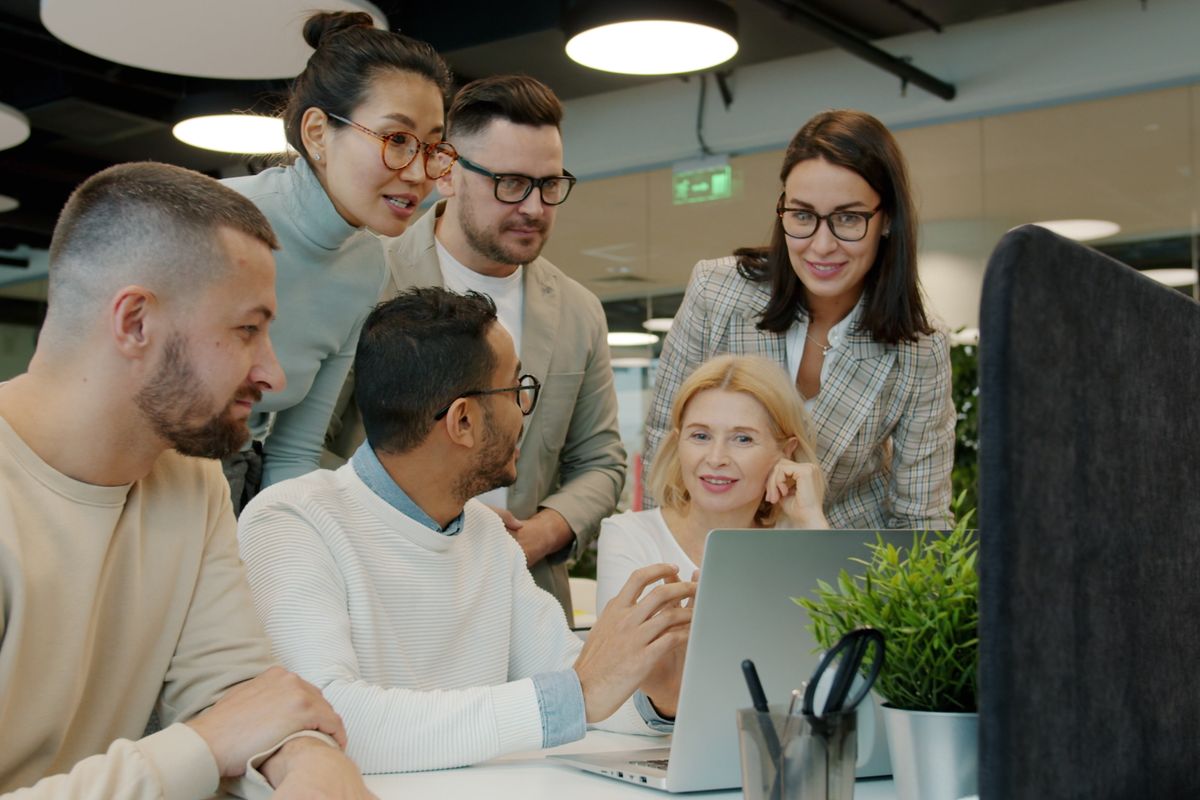 A team working through the day at their desks