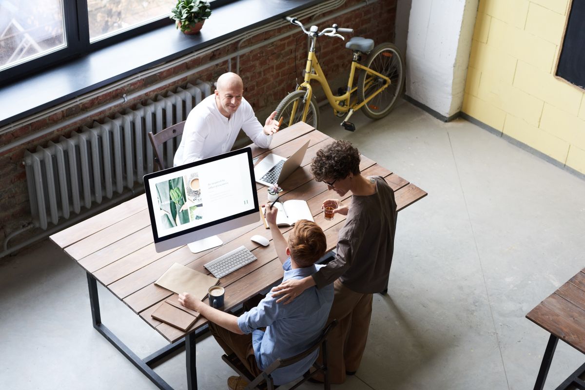 Team reviewing an online listing together